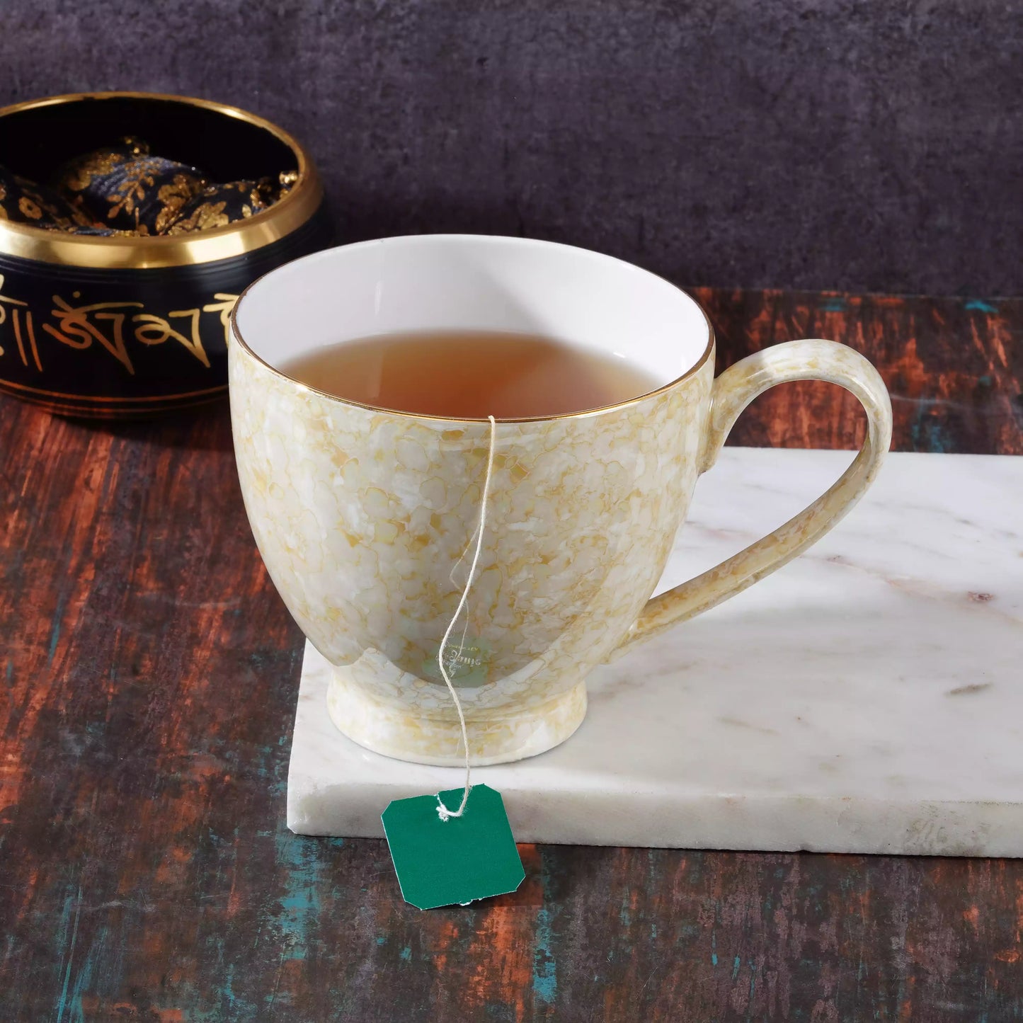 Noah Footed Mug in Marble Luster and Gold Line-stylish