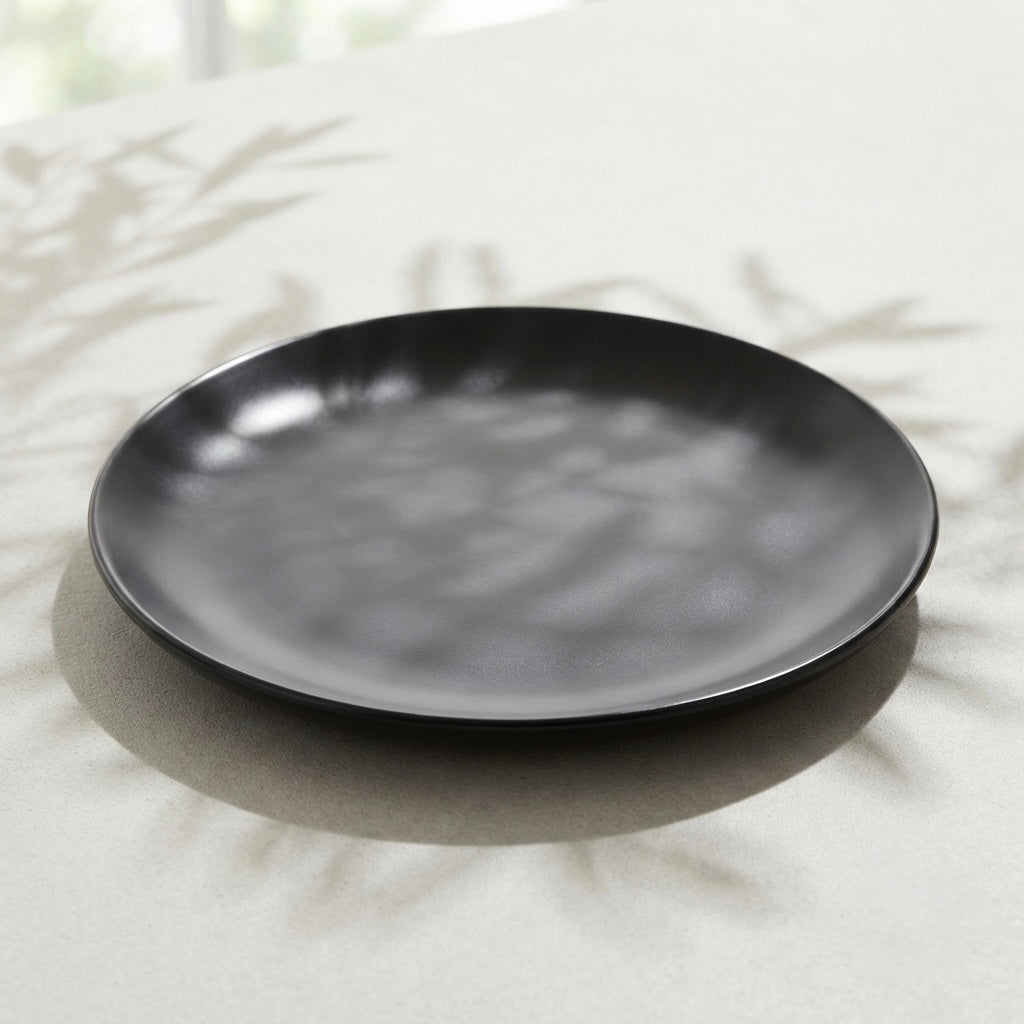 Side angle of Grey Matt Ceramic Sattva Full Plates featuring refined matte grey craftsmanship