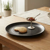 Top view of Grey Matt Ceramic Sattva Quarter Plates with smooth matte surface and round shape
